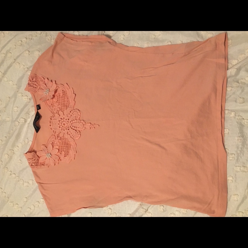 Pink flower shirt.